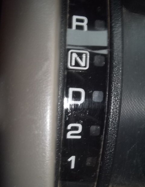 Push lever to R(Reverse) mode to reverse